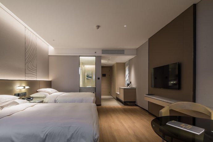 Imagen de la habitación del Hotel Courtyard by Marriott Changchun. Foto 16