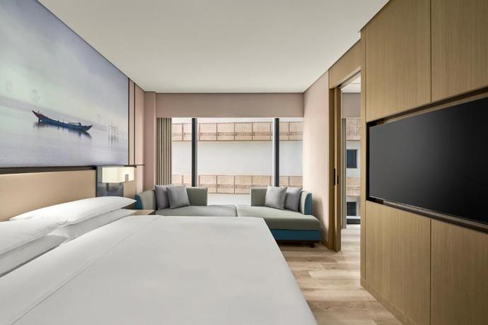 Imagen de la habitación del Hotel Courtyard by Marriott Danang Han River. Foto 10