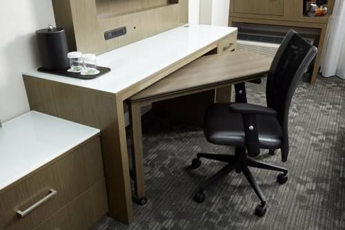 Imagen de la habitación del Hotel Courtyard by Marriott Detroit Brighton. Foto 3