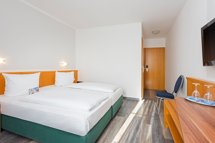Imagen de la habitación del Hotel Courtyard by Marriott Dortmund. Foto 13