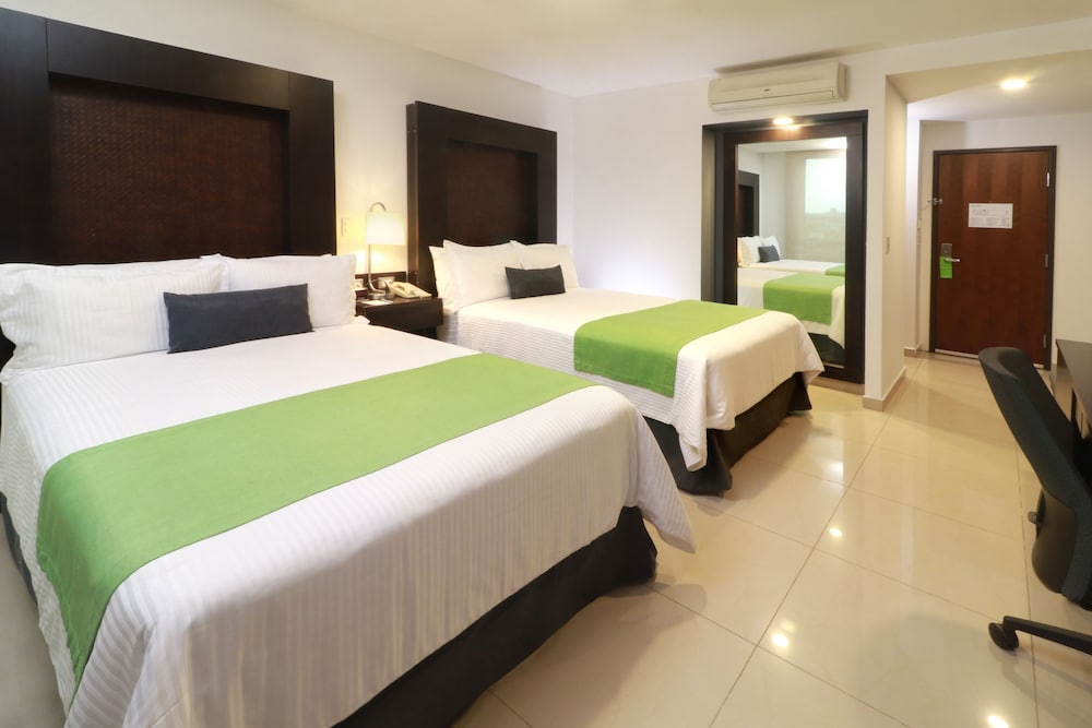 Imagen de la habitación del Hotel Courtyard by Marriott Guadalajara Andares. Foto 14