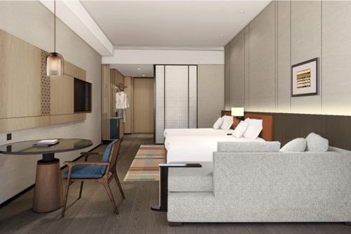 Imagen de la habitación del Hotel Courtyard by Marriott Nanning Wuxiang. Foto 10