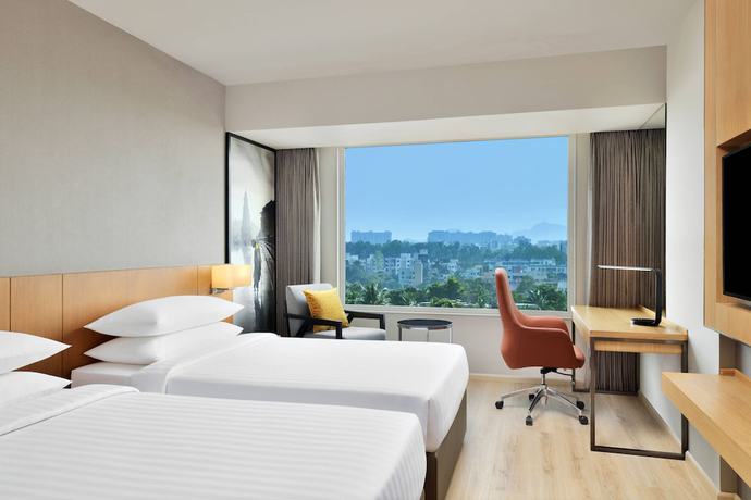 Imagen de la habitación del Hotel Courtyard by Marriott Nashik. Foto 4