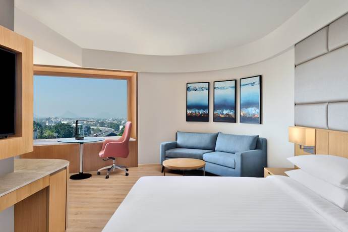 Imagen de la habitación del Hotel Courtyard by Marriott Nashik. Foto 9