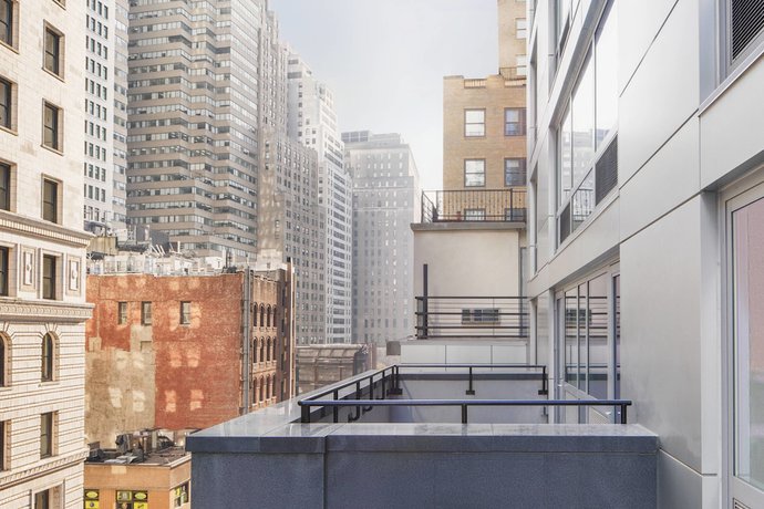 Imagen de la habitación del Hotel Courtyard by Marriott New York World Trade Center Area. Foto 15