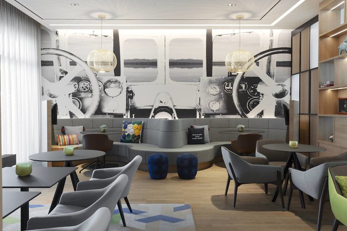 Imagen del bar/restaurante del Hotel Courtyard by Marriott Oberpfaffenhofen Munich South. Foto 2