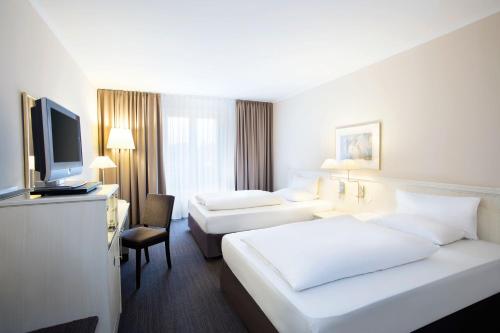 Imagen de la habitación del Hotel Courtyard by Marriott Schwerin. Foto 19