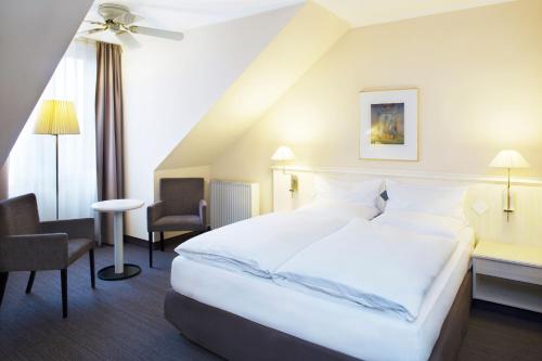 Imagen de la habitación del Hotel Courtyard by Marriott Schwerin. Foto 20