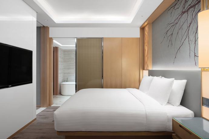 Imagen de la habitación del Hotel Courtyard by Marriott Shanghai Songjiang. Foto 11