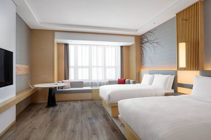 Imagen de la habitación del Hotel Courtyard by Marriott Shanghai Songjiang. Foto 15
