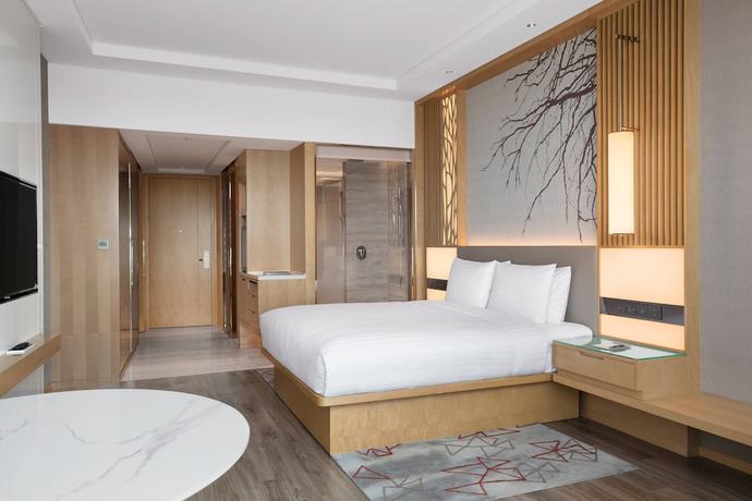Imagen de la habitación del Hotel Courtyard by Marriott Shanghai Songjiang. Foto 18