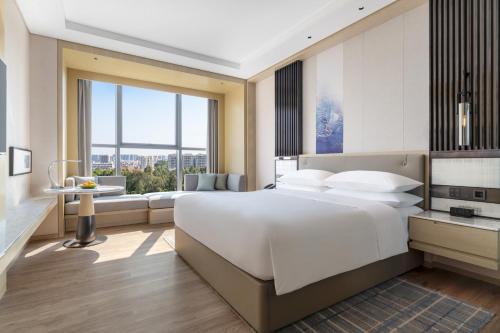 Imagen de la habitación del Hotel Courtyard by Marriott Shanwei Haifeng. Foto 14