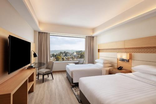 Imagen de la habitación del Hotel Courtyard by Marriott Shillong. Foto 17