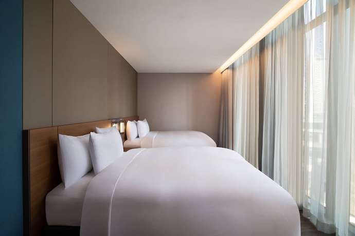 Imagen de la habitación del Hotel Courtyard by Marriott Suwon. Foto 19