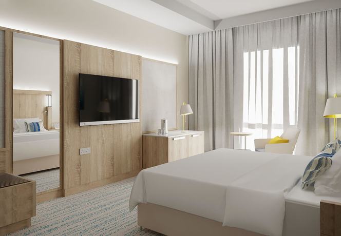 Imagen de la habitación del Hotel Courtyard by Marriott Vilnius City Center. Foto 8