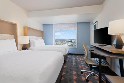 Imagen de la habitación del Hotel Courtyard by Marriott across Universal Orlando. Foto 17