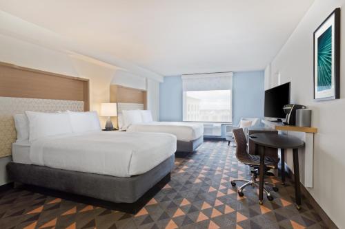 Imagen de la habitación del Hotel Courtyard by Marriott across Universal Orlando. Foto 19