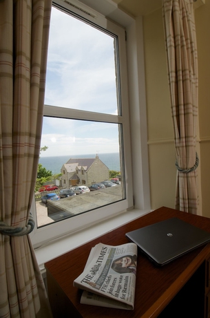 Imagen de la habitación del Hotel Cove Bay. Foto 10