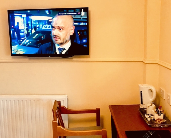 Imagen de la habitación del Hotel Cove Bay. Foto 12