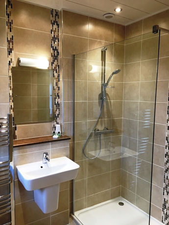 Imagen de la habitación del Hotel Cove Bay. Foto 15