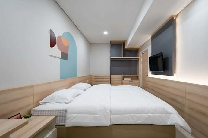 Imagen de la habitación del Hotel Cove Bona Sort Pasar Baru. Foto 19