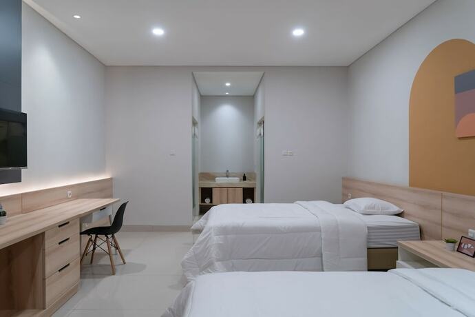 Imagen de la habitación del Hotel Cove Bona Sort Pasar Baru. Foto 20