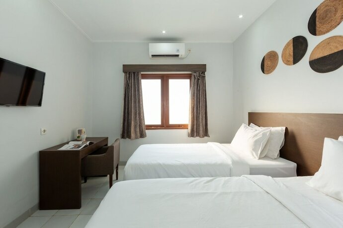 Imagen de la habitación del Hotel Cove Matahari Guesthouse. Foto 15