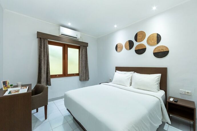 Imagen de la habitación del Hotel Cove Matahari Guesthouse. Foto 16