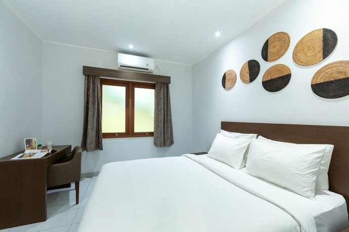 Imagen de la habitación del Hotel Cove Matahari Guesthouse. Foto 17