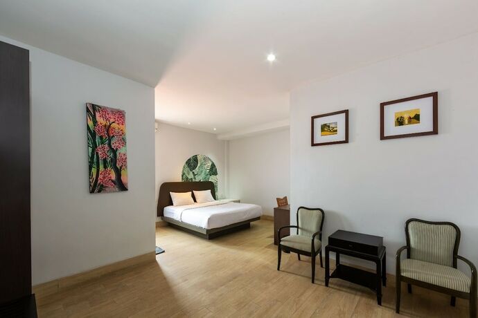 Imagen de la habitación del Hotel Cove Matahari Senja. Foto 16