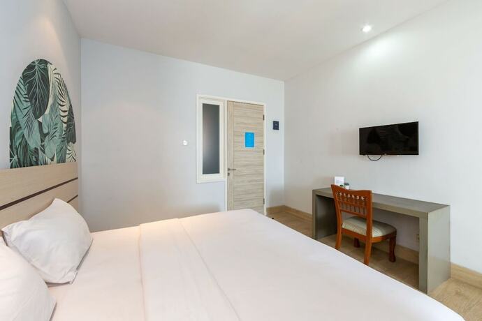 Imagen de la habitación del Hotel Cove Matahari Senja. Foto 18