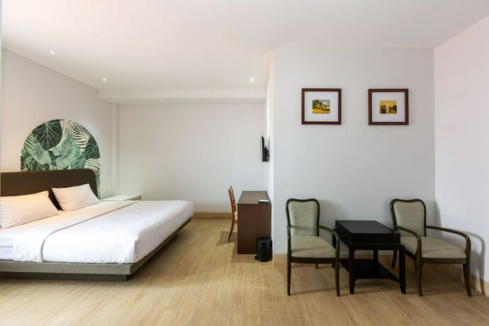 Imagen de la habitación del Hotel Cove Matahari Senja. Foto 19