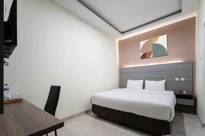 Imagen de la habitación del Hotel Cove West Inn. Foto 13