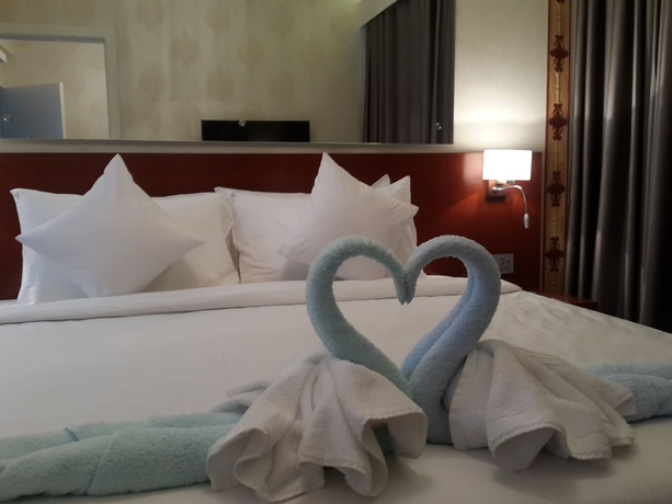 Imagen de la habitación del Hotel Coventina Lake Suites. Foto 5