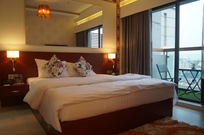 Imagen de la habitación del Hotel Coventina Lake Suites. Foto 10