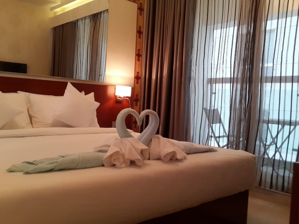 Imagen de la habitación del Hotel Coventina Lake Suites. Foto 11