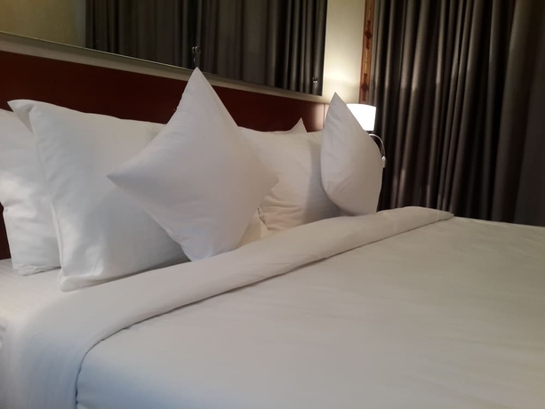 Imagen de la habitación del Hotel Coventina Lake Suites. Foto 12