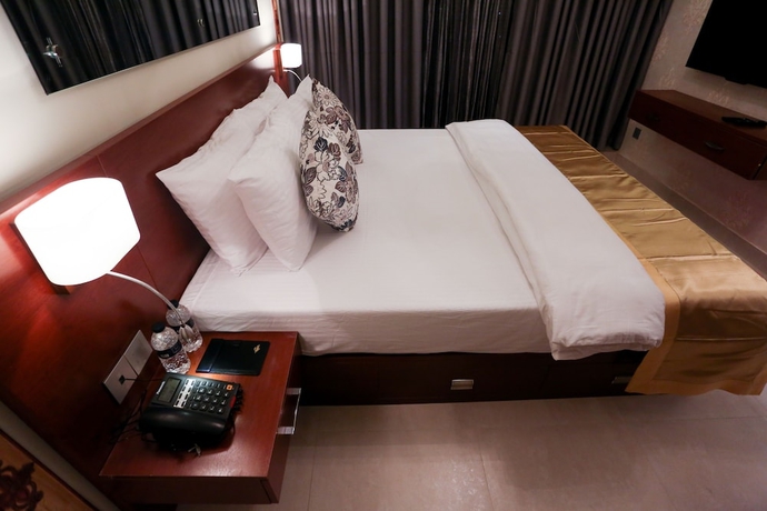 Imagen de la habitación del Hotel Coventina Lake Suites. Foto 13