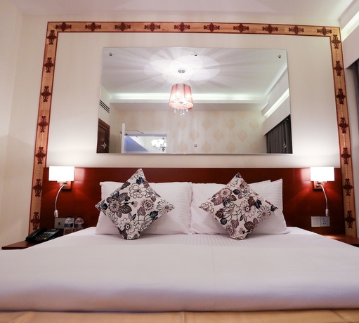 Imagen de la habitación del Hotel Coventina Lake Suites. Foto 14