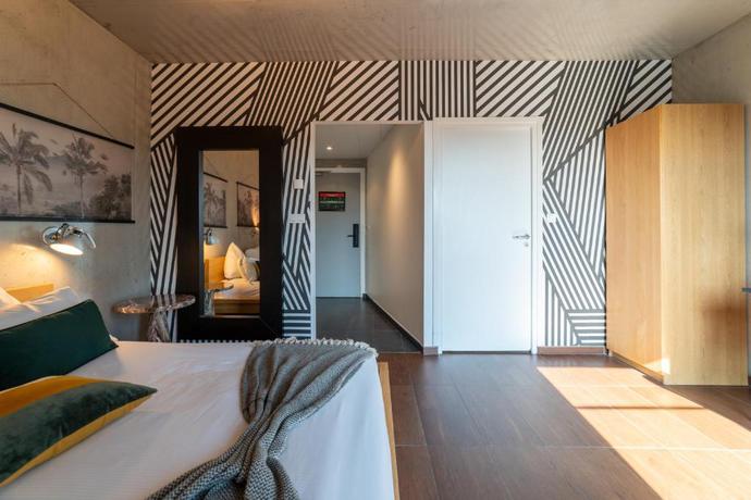 Imagen de la habitación del Hotel Cowool Lille Villeneuve D'Ascq. Foto 11