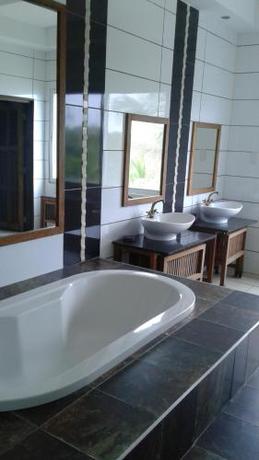 Imagen de la habitación del Hotel Cowrie Shell Beach Apartments. Foto 5