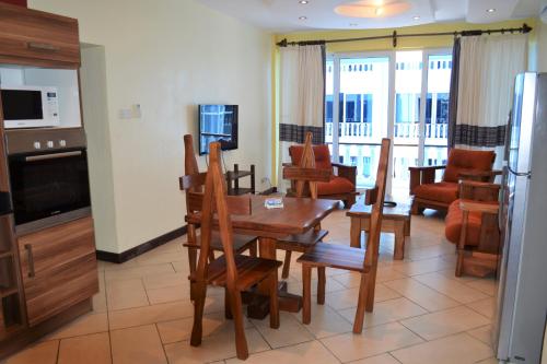 Imagen de la habitación del Hotel Cowrie Shell Beach Apartments. Foto 6