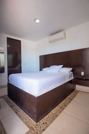 Imagen de la habitación del Hotel Coyula Huatulco, Santa Mar&iacute;a Huatulco. Foto 9