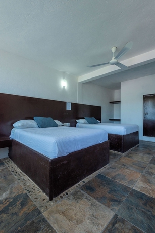 Imagen de la habitación del Hotel Coyula Huatulco, Santa Mar&iacute;a Huatulco. Foto 13