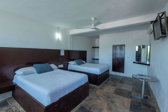 Imagen de la habitación del Hotel Coyula Huatulco, Santa Mar&iacute;a Huatulco. Foto 14