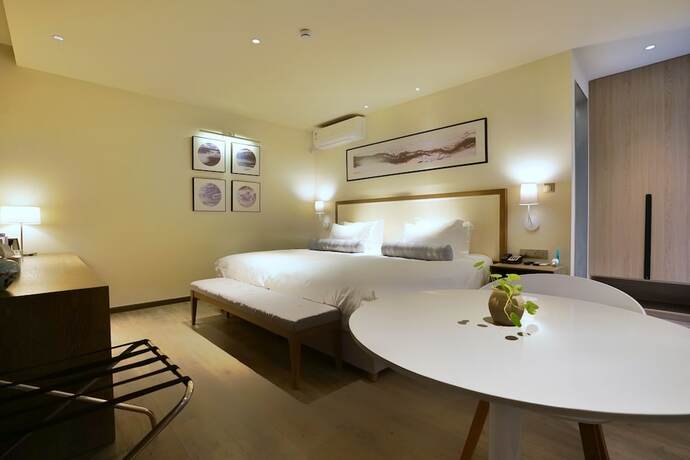 Imagen de la habitación del Hotel Cozi Cottage. Foto 19