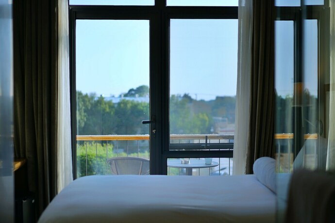 Imagen de la habitación del Hotel Cozi Cottage. Foto 20