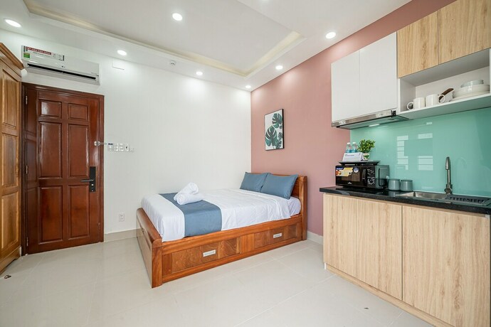 Imagen de la habitación del Hotel Cozrum Homes - Retro House. Foto 20
