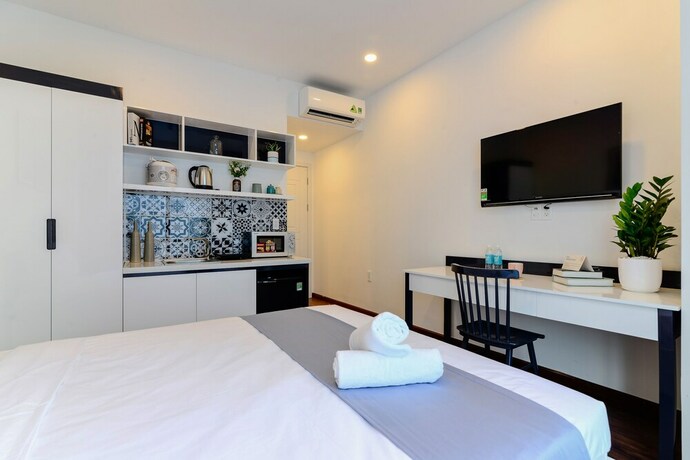 Imagen de la habitación del Hotel Cozrum Homes The Gallery Residence. Foto 14