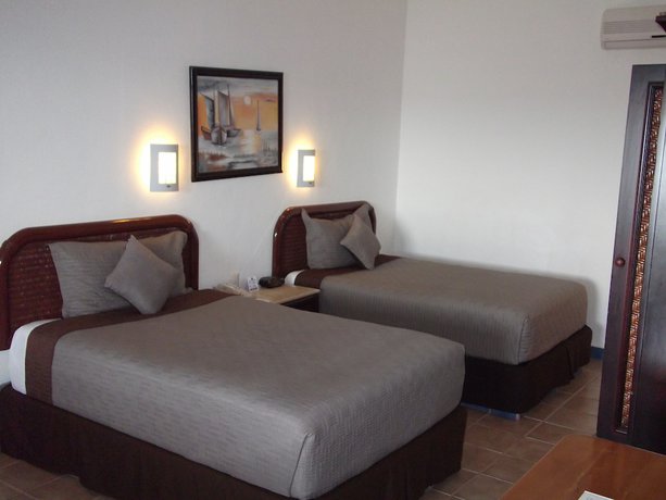 Imagen de la habitación del Hotel Cozumel Hotel & Resort, Trademark Collection by Wyndham. Foto 5